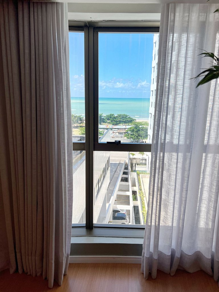 Suíte Aconchegante Com Piso de Madeira Na Beira Mar