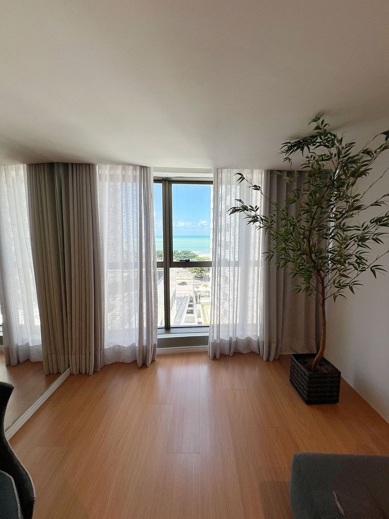 Suíte Aconchegante Com Piso de Madeira Na Beira Mar